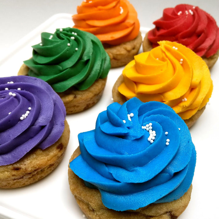 Cookie Cupcakes - chocolate cookie with M&Ms  and chocolate chunk cookie cups with rainbow icing on top